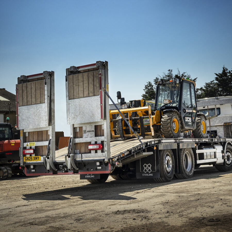 Volvo FMX 8x2 32T Chassis mounted with a Sterling Megaload plant body