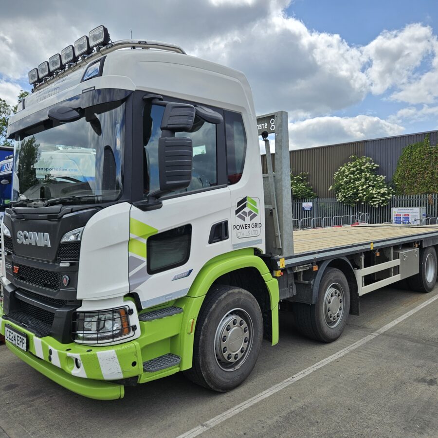 Close up shot of a Power Grid Civils beavertail truck, built by Sterling GP