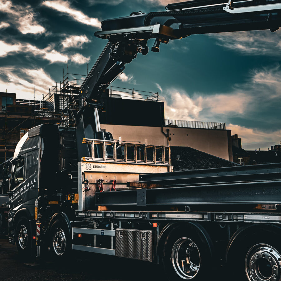 A sterling multiload beavertail crane truck
